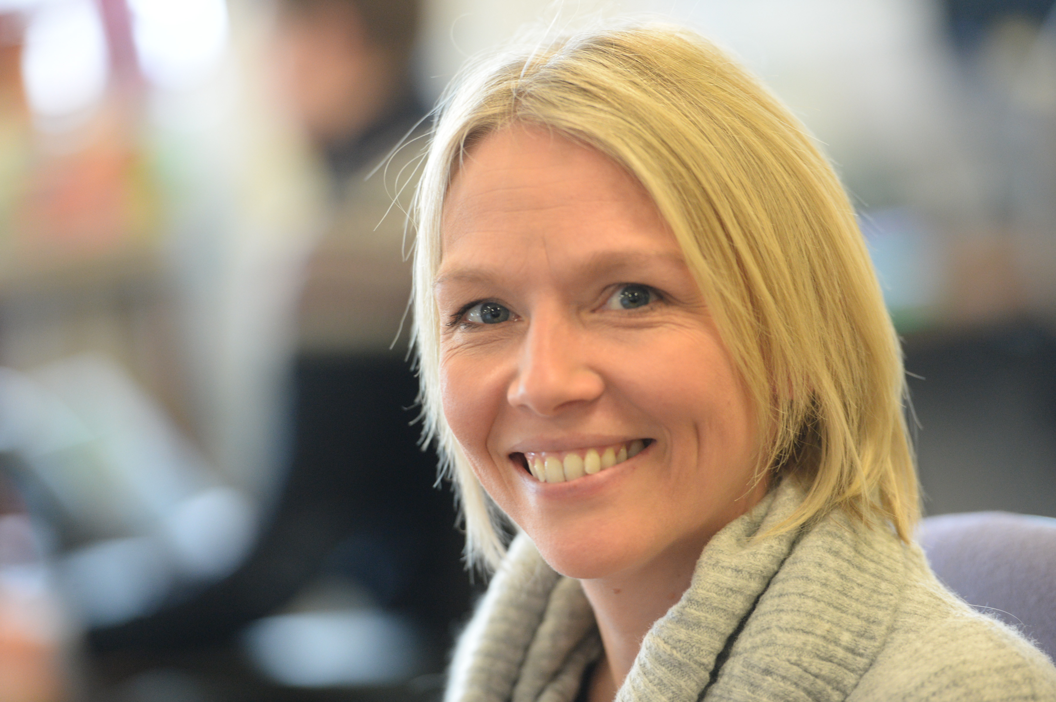 An NHSBT staff member smiling