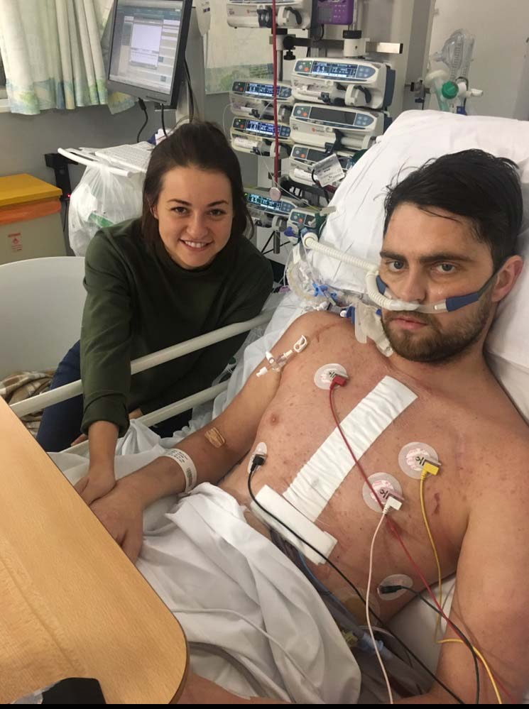 Aaron Mellis and Amber Hagan in hospital
