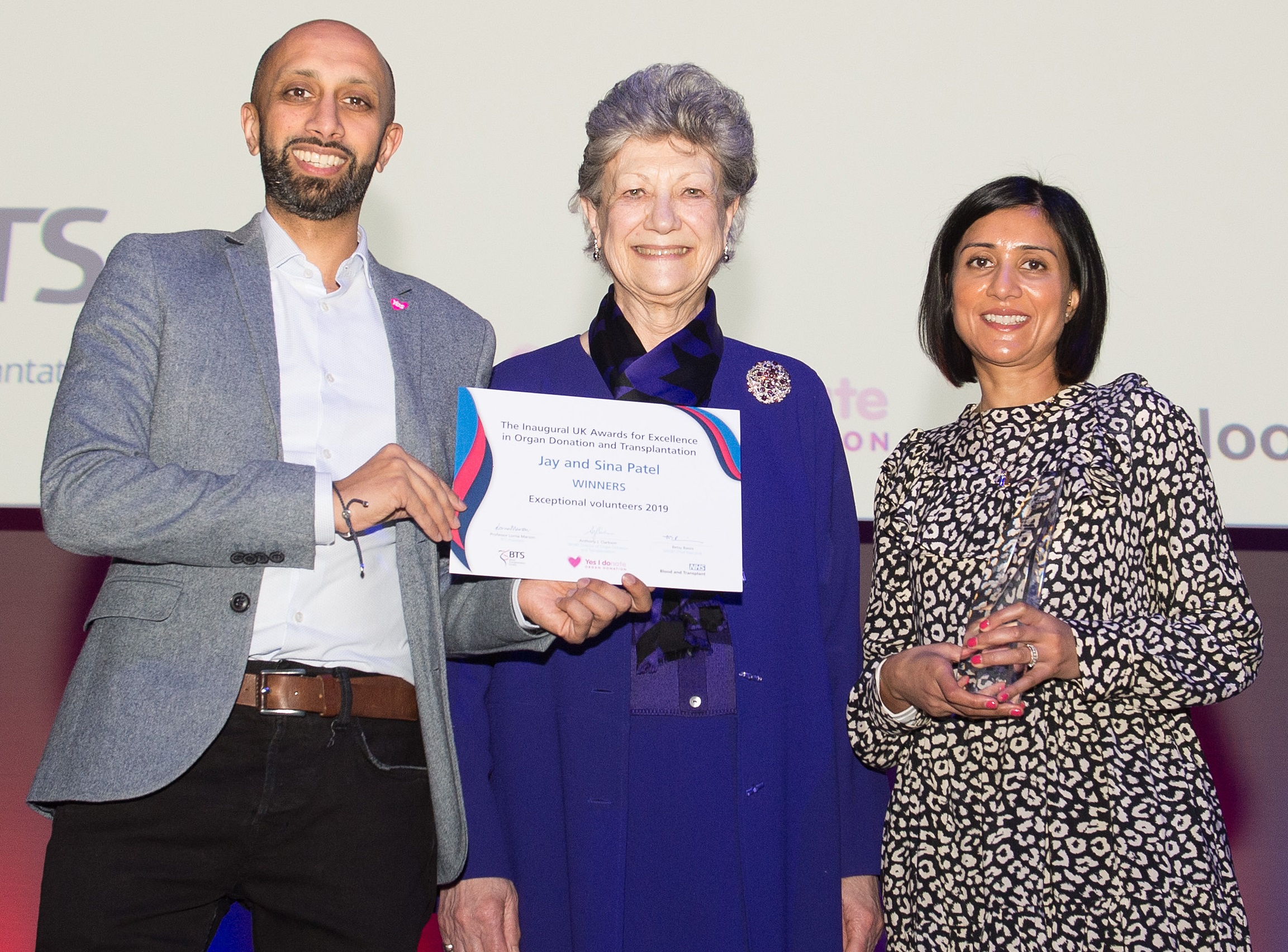 Jay and Sina Patel receiving the Exceptional Volunteer award
