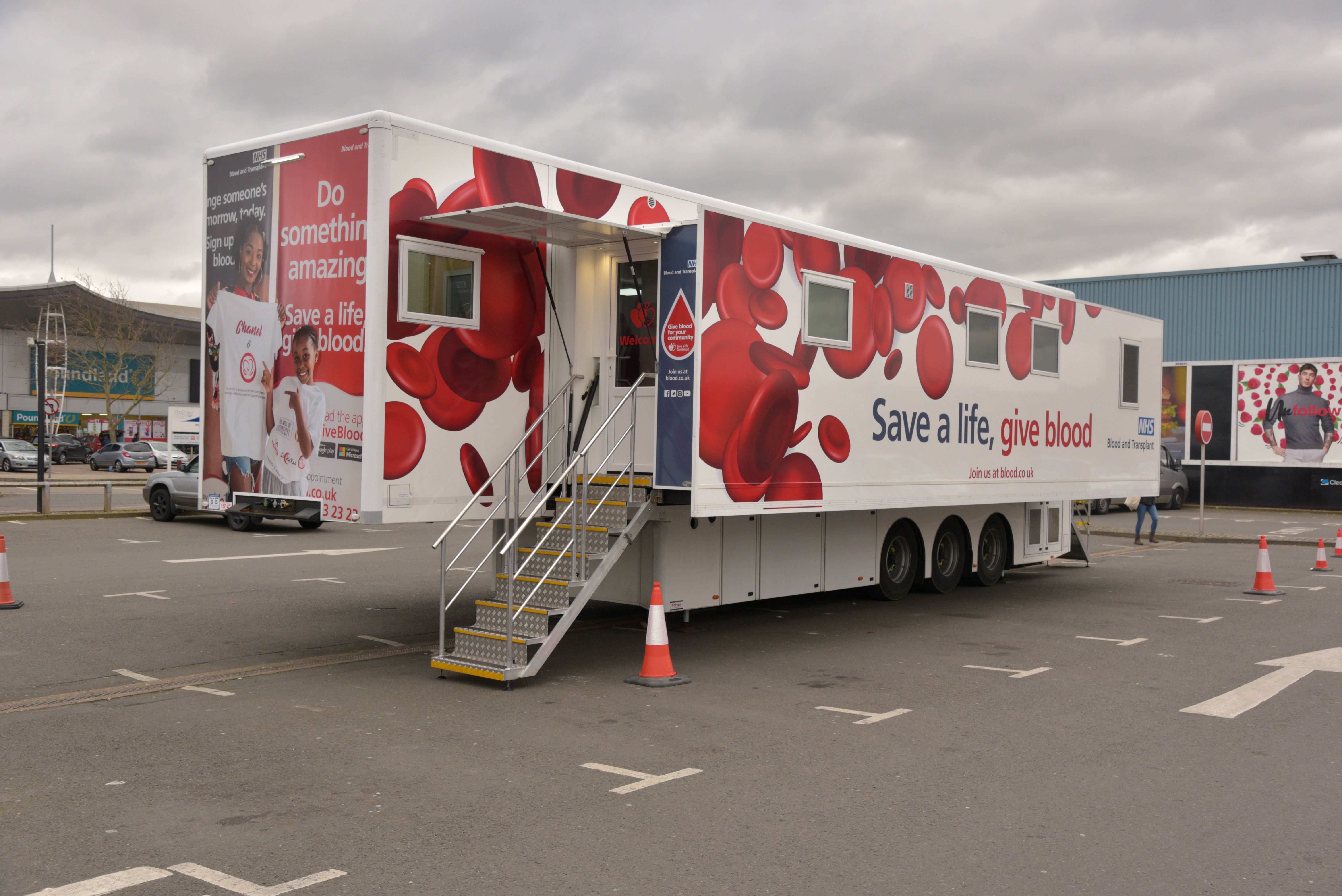 Blood mobile in a car park