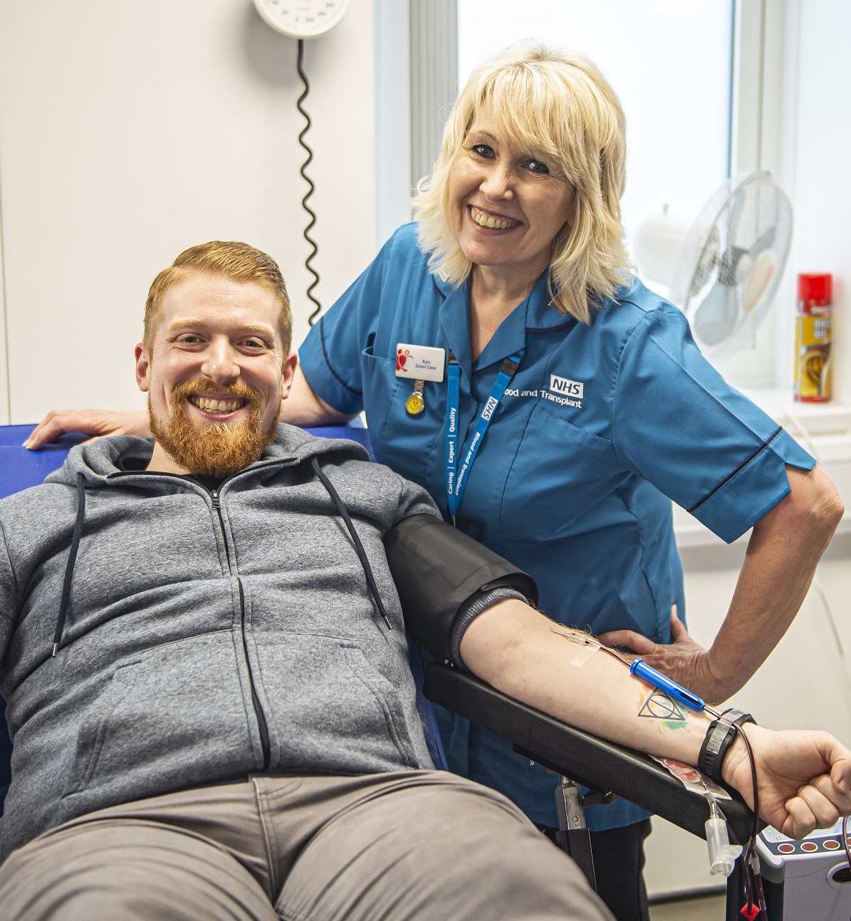 David Pulman and a Blood Donation nurse pose for a photo as David donates