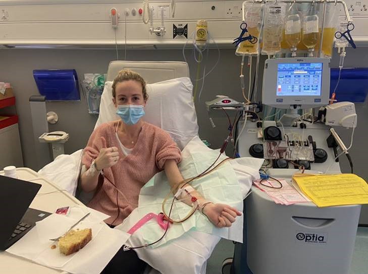 Charlotte gives a thumbs up as she receives some plasma
