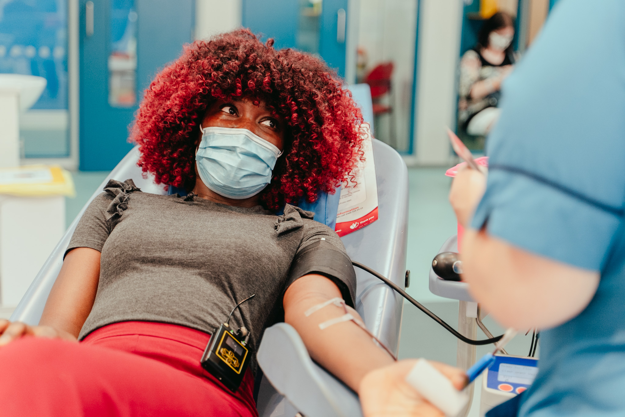 Blood donor of Black heritage donating