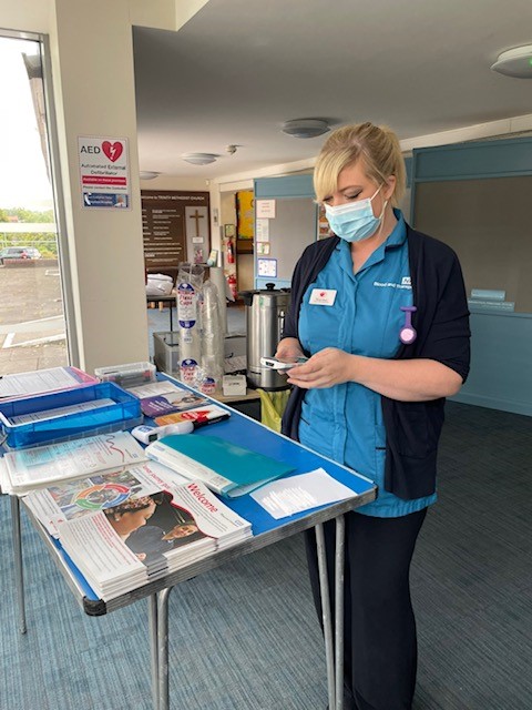 One of our donor carers using the new hand-held device