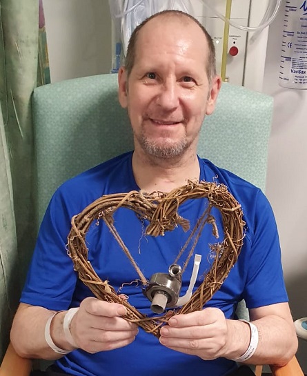 Stephen pictured smiling in hospital, a couple of days after his transplant