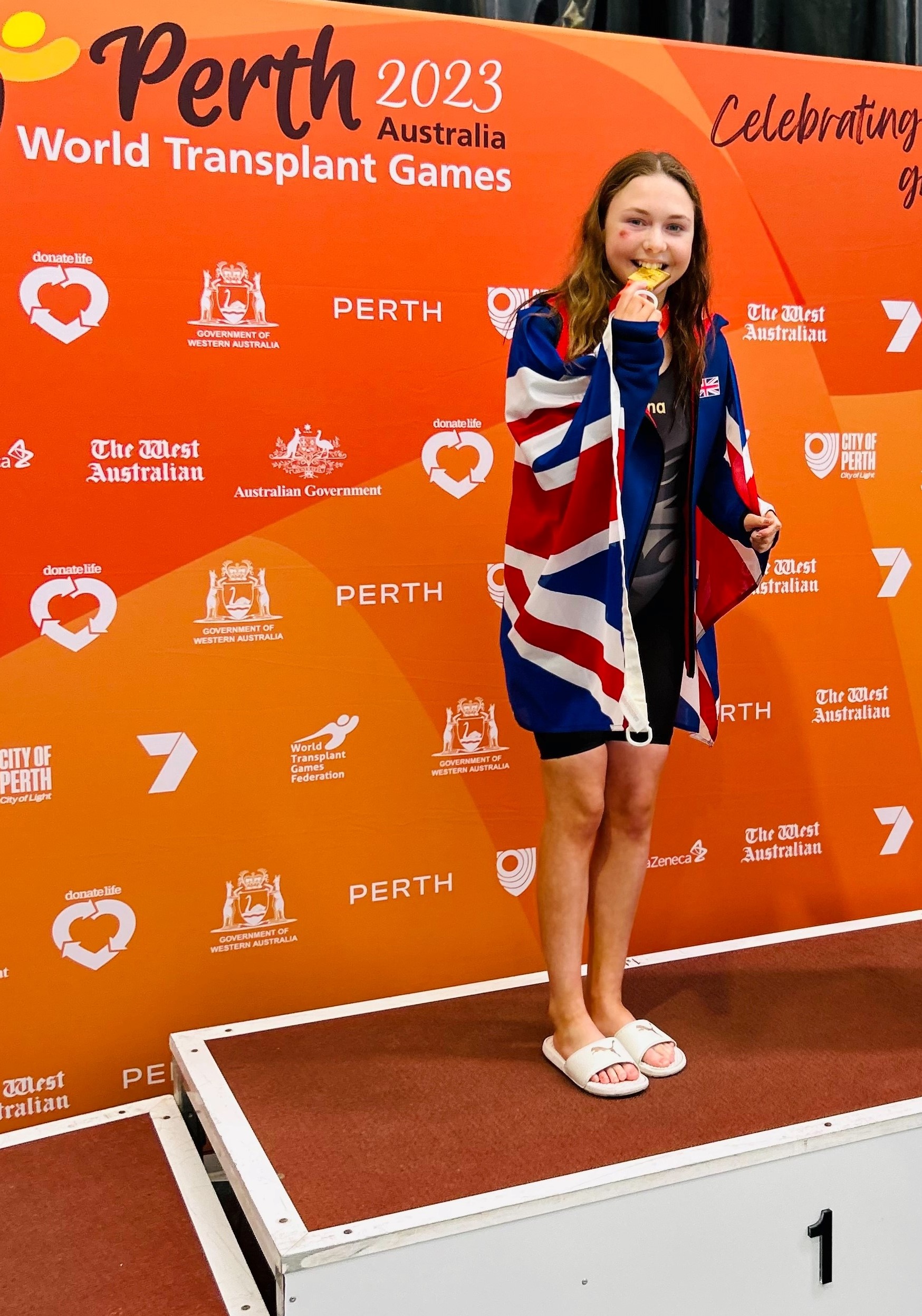 Ava with a medal at the Perth Transplant Games