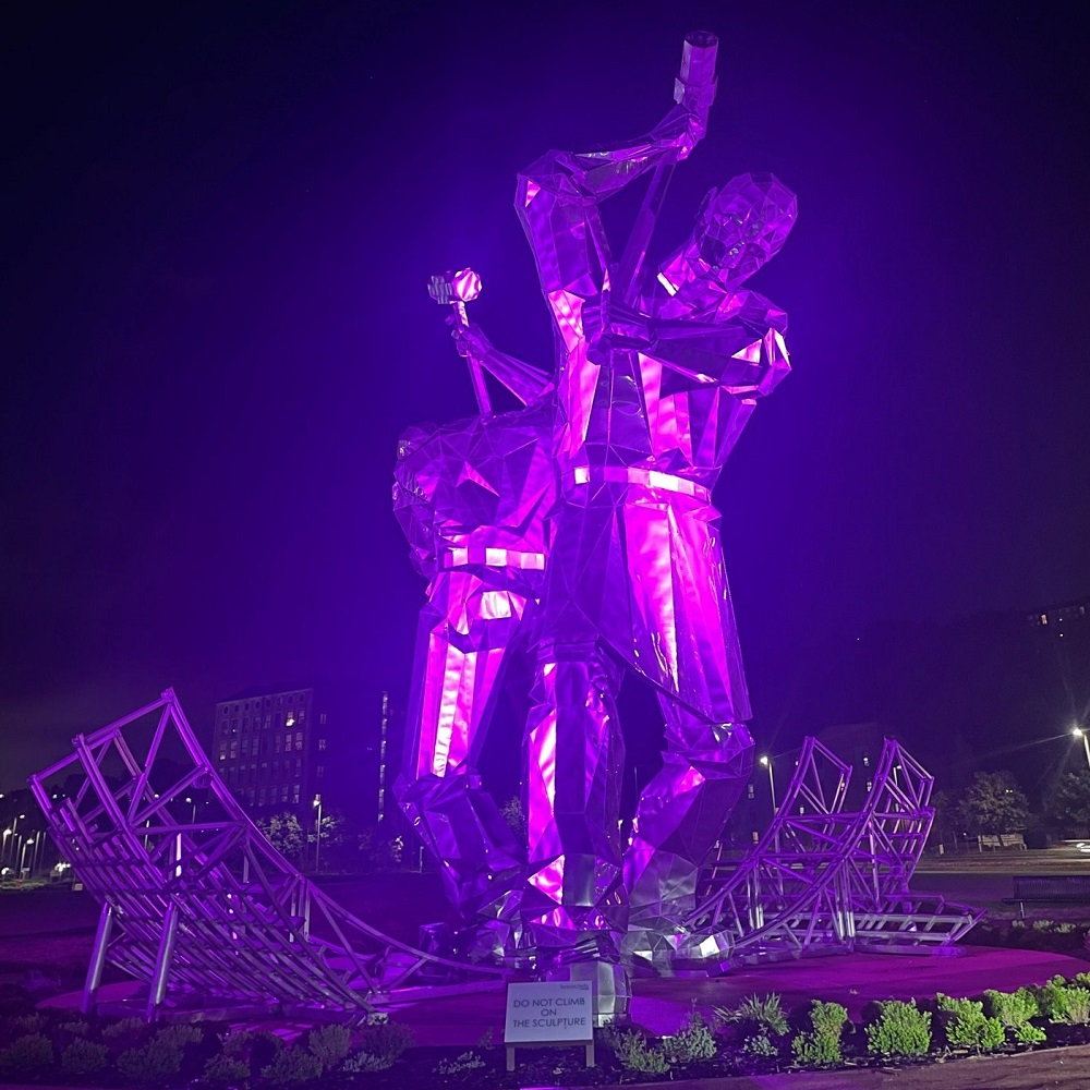 The Shipbuilders of Port Glasgow sculpture lit up pink in support of Organ Donation Week