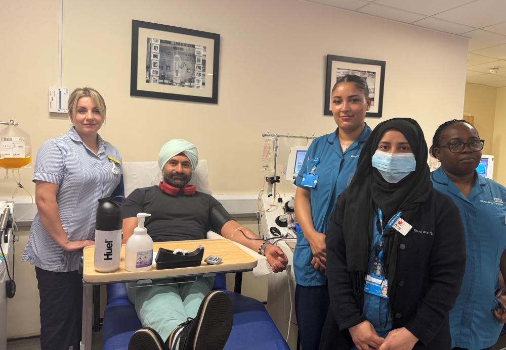 Deepak with NHS Blood and Transplant staff during a platelet donation