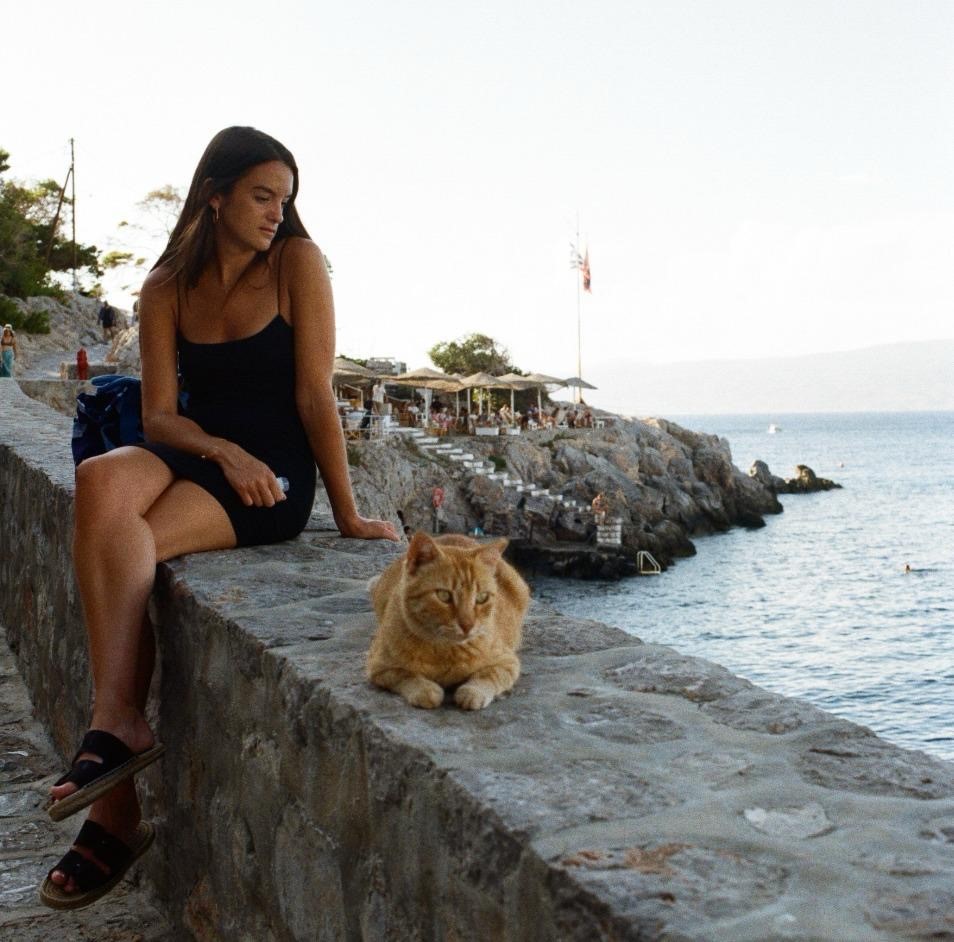 Pandora by the sea with a cat