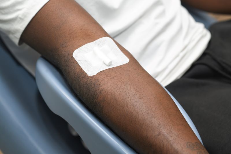 A plaster on a donor's arm