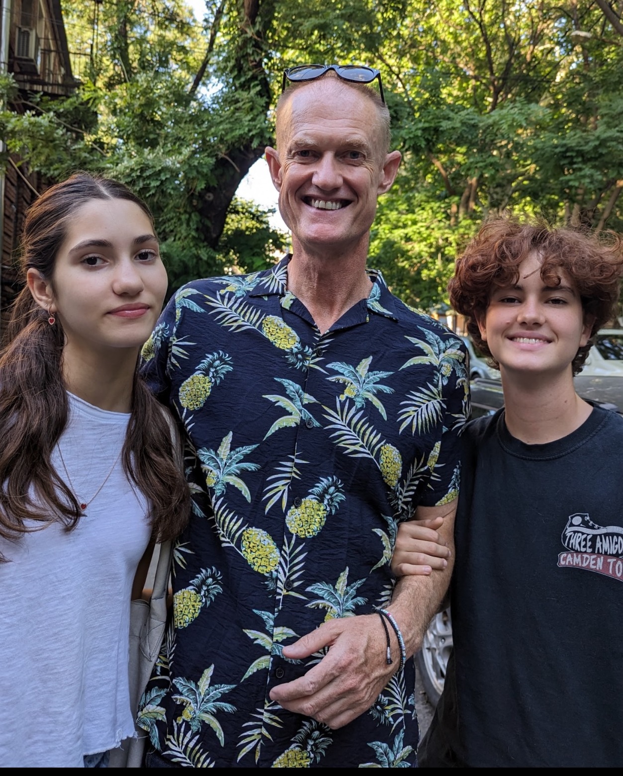 Nick Beresford pictured outside, standing with his 2 children beside him