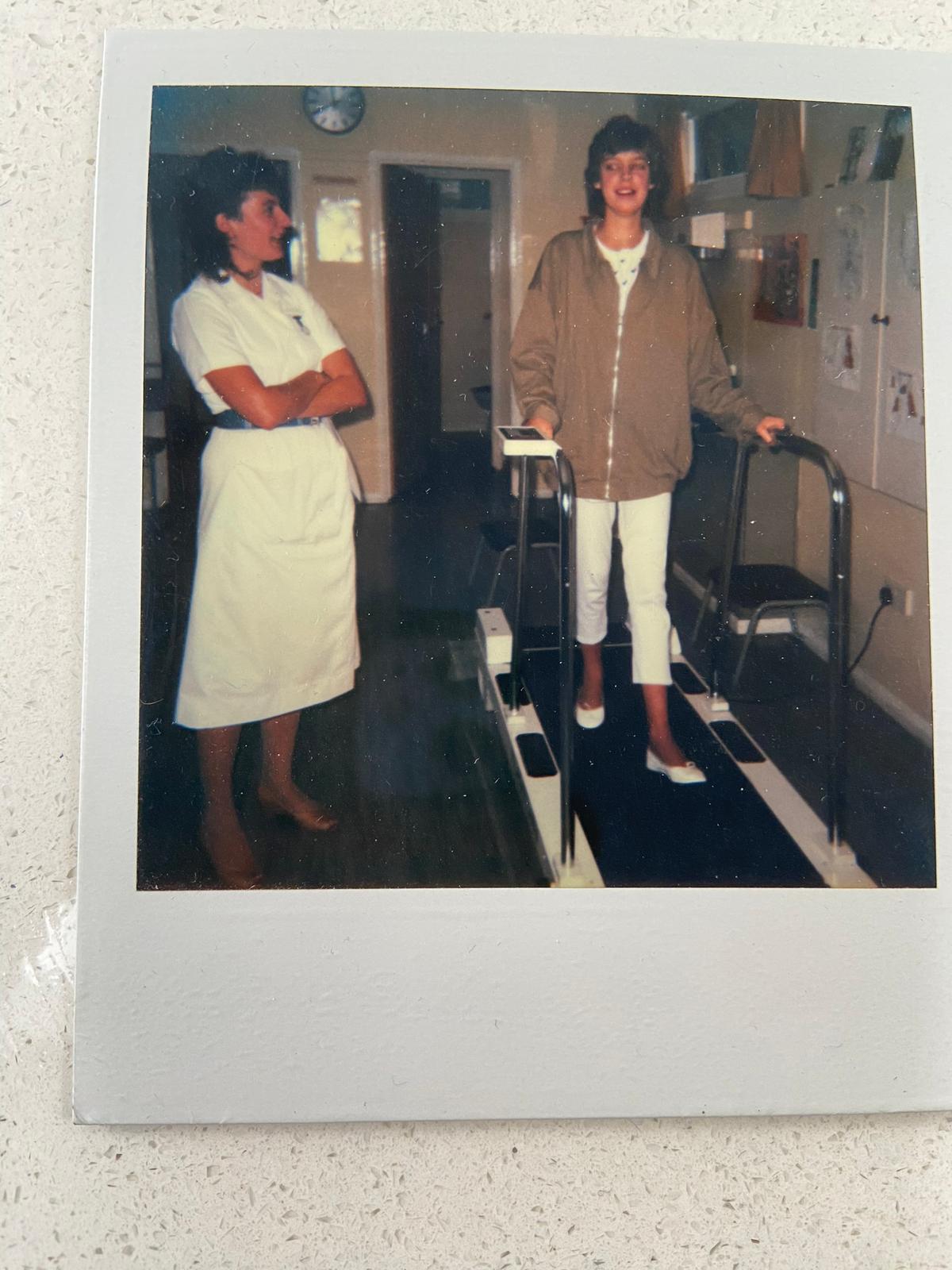 Katie at hospital, walking on a treadmill following her transplant