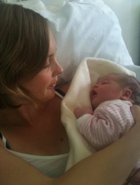 Amy, holding baby Issy