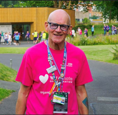 Paul Dixon wearing an organ donation t-shirt