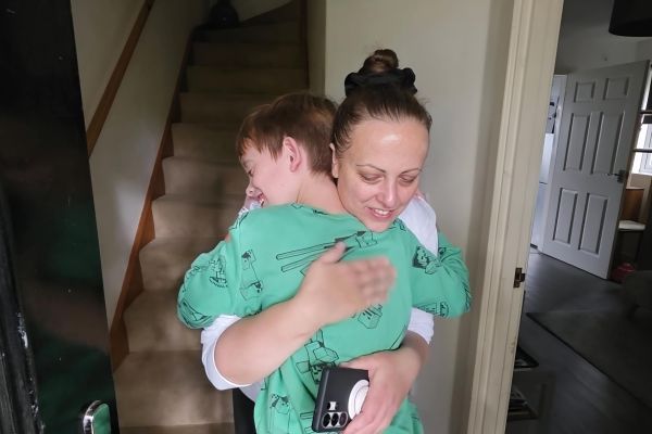 Elliot hugging his mum