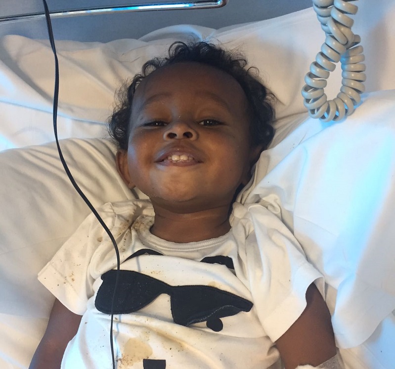 Mason in a hospital bed